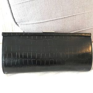 Leather clutch with faux crocodile print